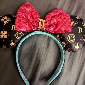 Black pink and gold Minnie mouse ears from Disneyland